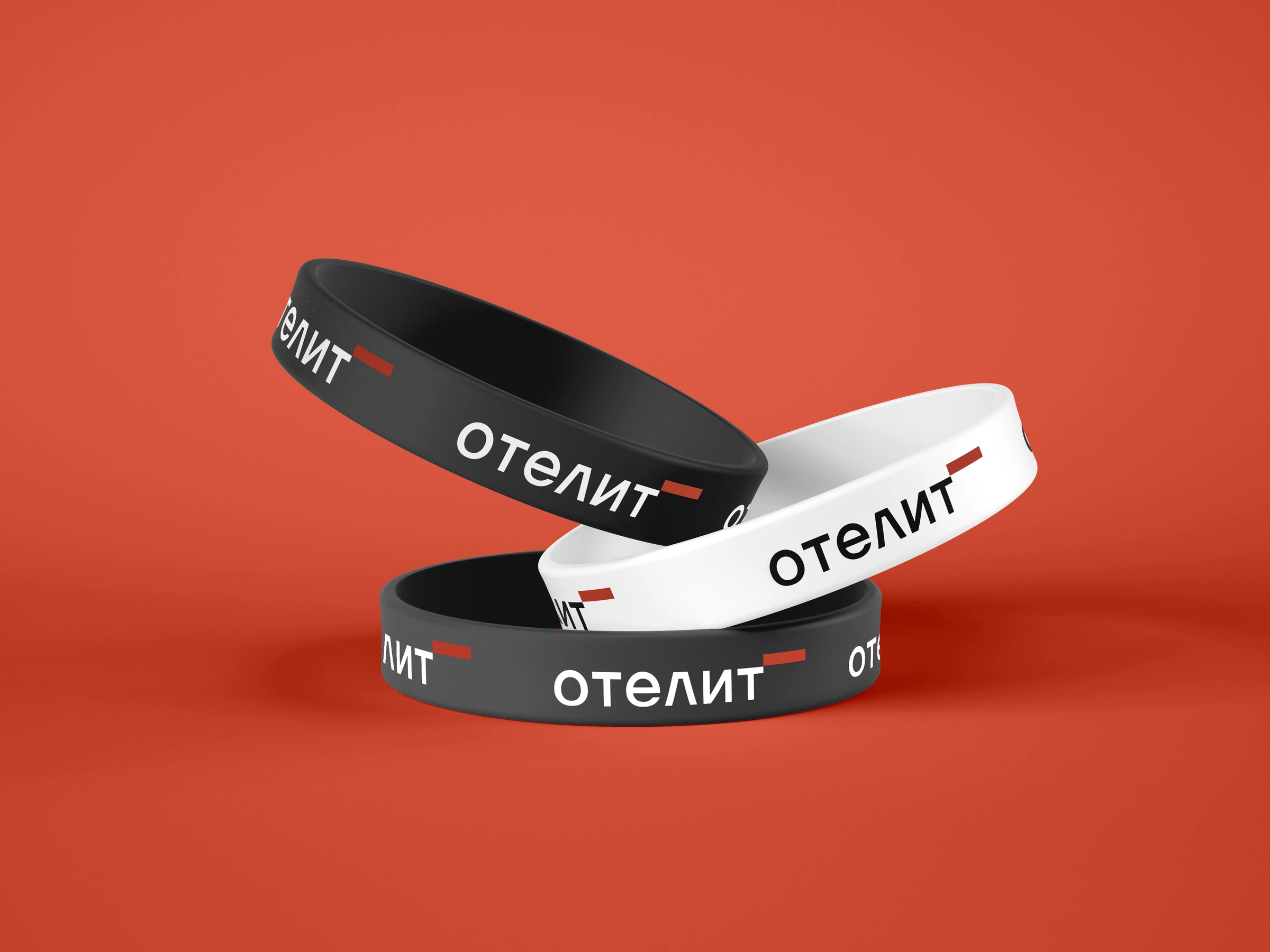 Otelit growth concept on black and white wristbands